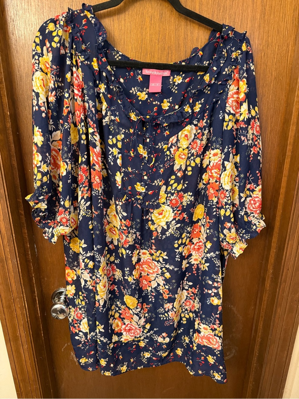 Woman within blue floral tunic size 1X